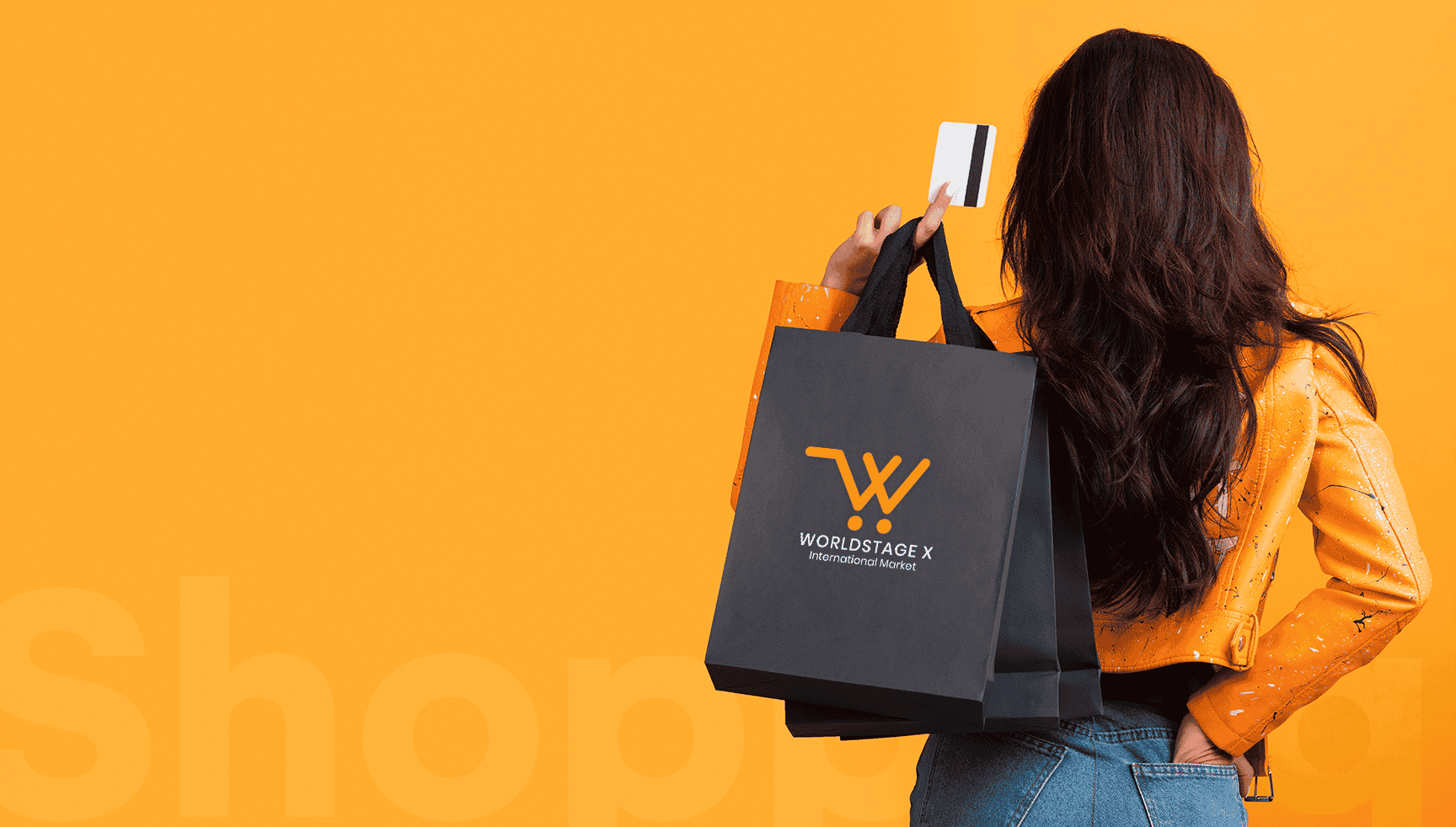  A woman holds a shopping bag labeled 'worldstage x,' featuring the worldstage x company logo prominently displayed.