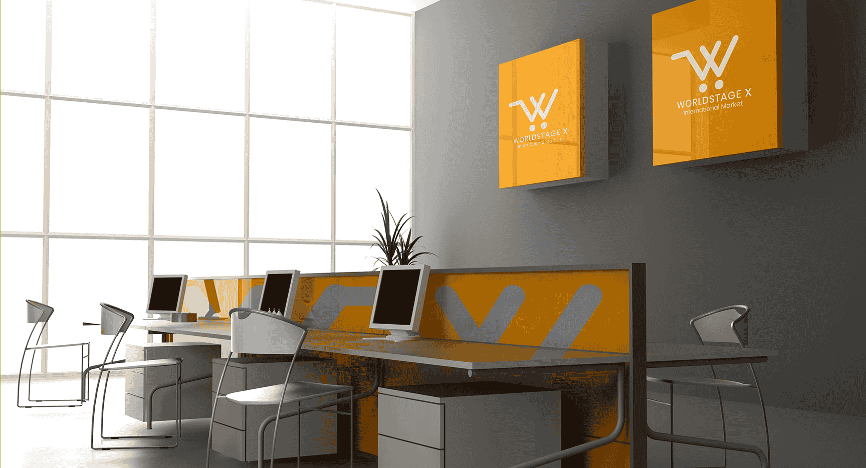 A modern office featuring a large desk with two computers, showcasing the branding of WORLDSTAGE X company.