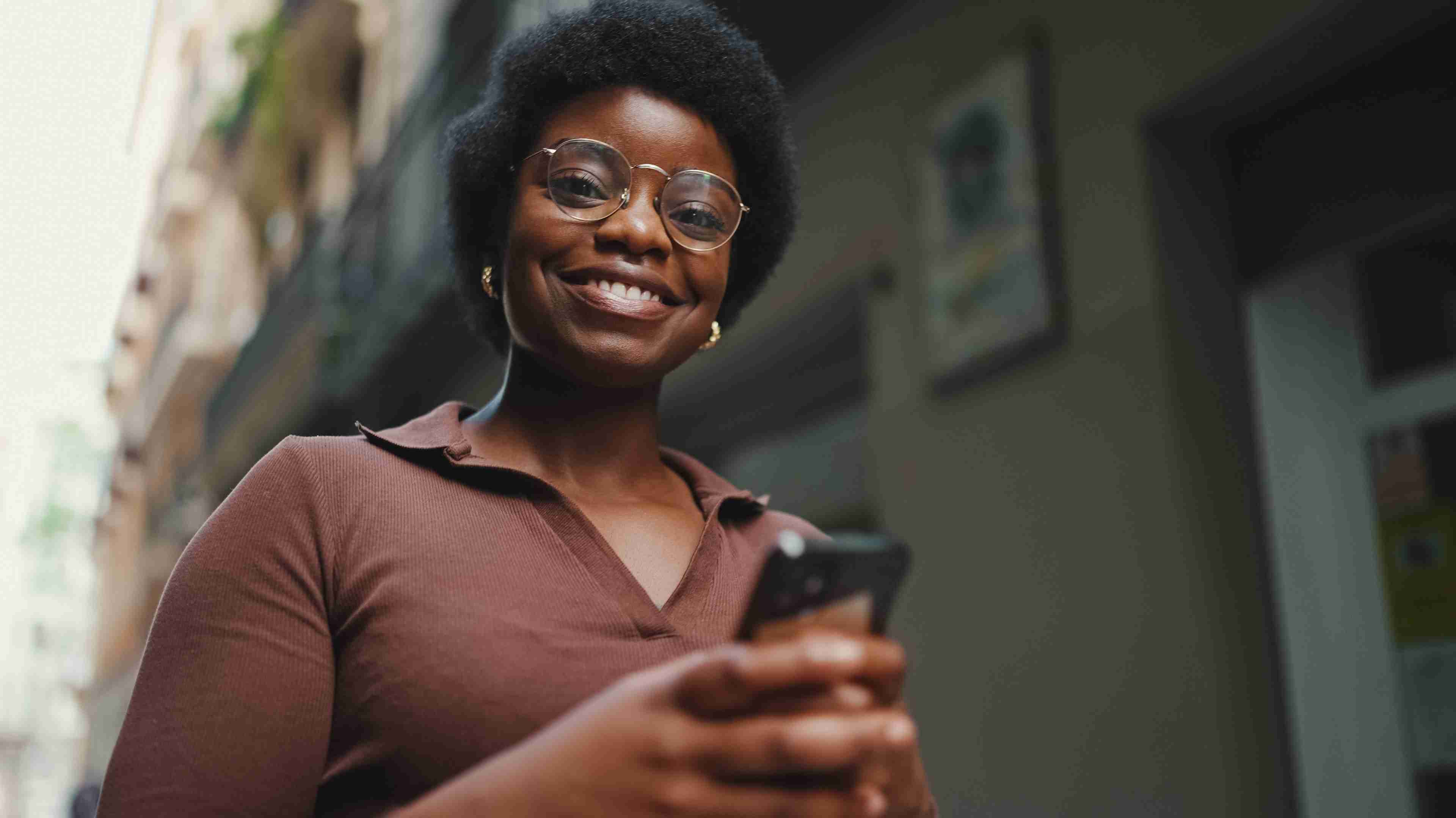 Woman using CLIKPAY on mobile