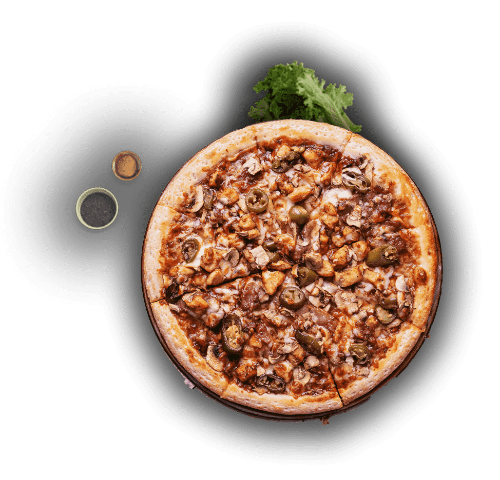 A delicious pizza topped with a variety of meats and fresh vegetables, showcasing vibrant colors and textures.