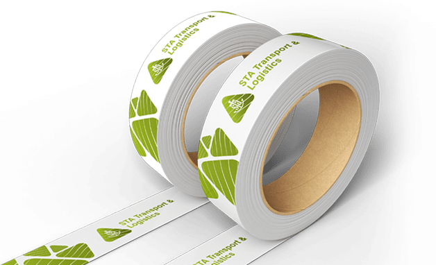 Two rolls of white tape featuring green and white logos, positioned side by side on a neutral background.